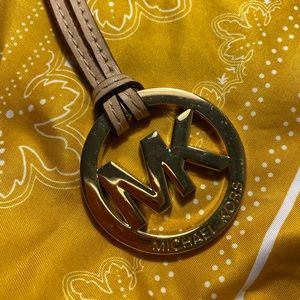 Michael Kors emblem gold in excellent condition